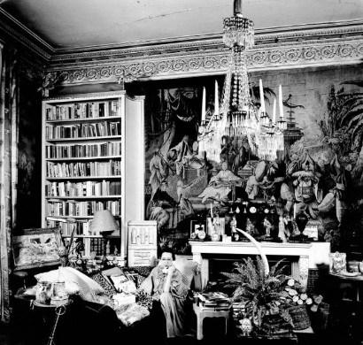 Schiaparelli in her Jean-Michel Frank-designed apartment, decorated with personal items from her artist friends