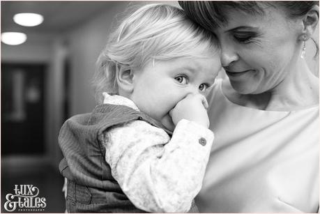 Yorkshire Wedding Photography | Katie & Gavin Got Married! Bride holds son at town hall wedding in yorkshire Autumn themed