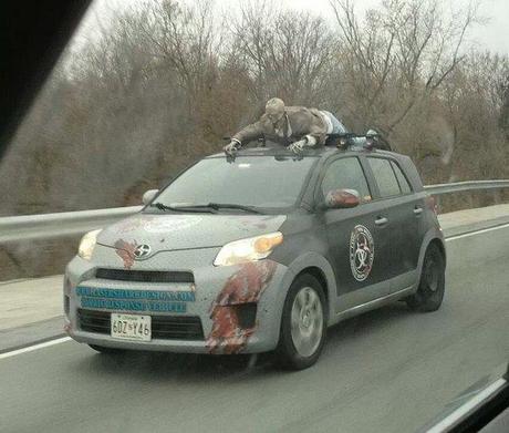 Pic of the Day: Just an Ordinary Hitchhiking Zombie zombie-car