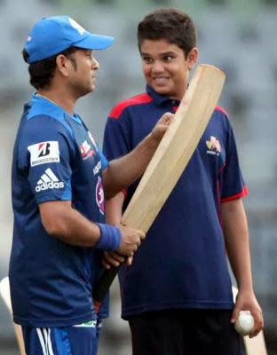 Shivnarine achieves what Sachin could not......... playing with his son