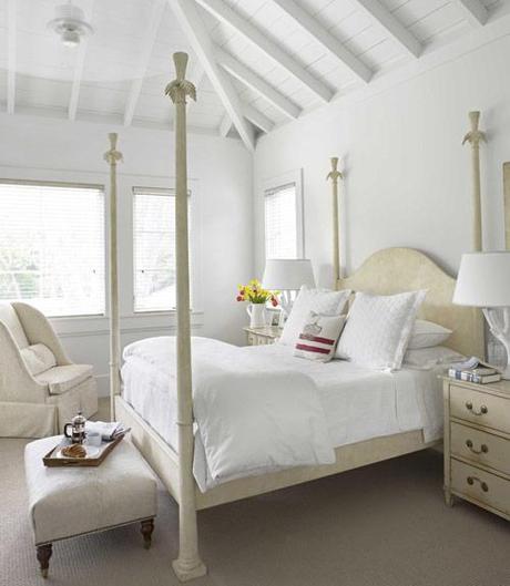 all white bedroom with beautiful architectural ceiling