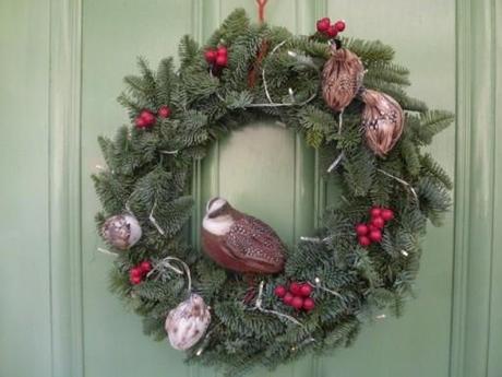 christmas wreath with bird sat on it