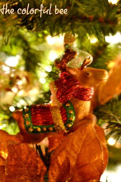 Putting Christmas Away horse Christmas ornament in tree