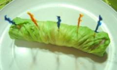 Healthy Turkey and Cheese Roll-Ups skewering lettuce roll up