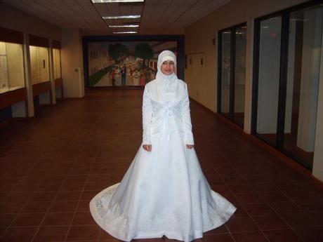 Muslim bride in traditional white dress