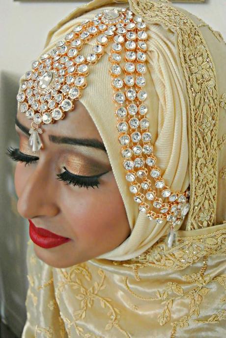 Muslim bride wearing elaborate hijab