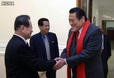 Antonio Inoki (R) shakes hands with KWP Secretary and Director of International Affairs Kim Yong Il (L) on 15 January 2-13 (Photo: KCNA).
