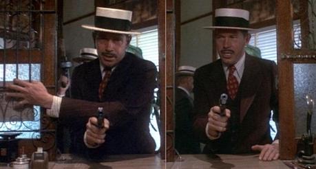 Truth vs. Fiction: The Bank-Robbing Style of Warren Oates as Dillinger Dillinger barks orders during the robbery.