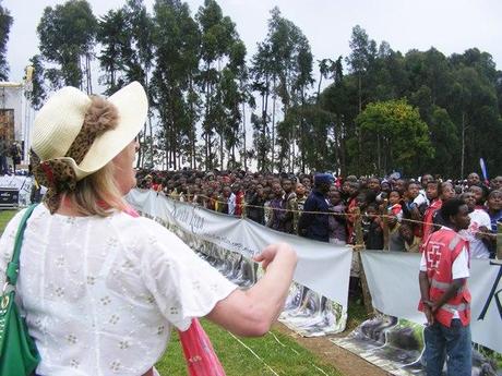 Jillian threw a frisbee into the crowd of Kwita Izina festival goers Jillian threw a frisbee into the crowd of Kwita Izina festival goers. gorilla naming ceremony