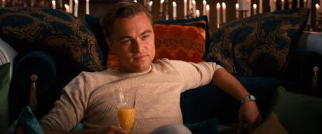 Gatsby’s Sweater Sweater and Linen Slacks (2013) Somehow, Leo looks like he's actually having less fun when he has a drink in his hand. GO FIGURE!
