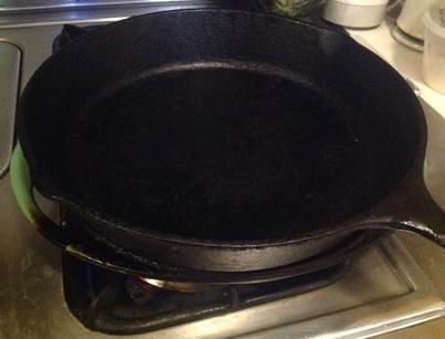 I weight mine with a cast iron skillet placed right on top.