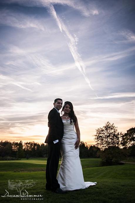 Bride and groom as sunset at Woolston Manor