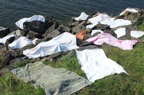 towels drying by the lake in Polonnaruwa