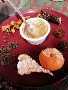 Monday's snackplate. Satsuma, stevia-sweetened chocolate chips, some Food Should Taste Good sweet potato kettle chips, energy bites from the bulk bin (I don't really like these), some homemade PB&J bites. 