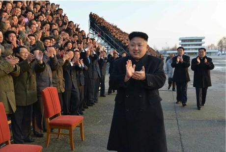 Kim Jong Un Attends Photo-op With Agricultural Subteam Conference Participants Kim Jong Un applauds during a commemorative photo-op with participants in the conference of agricultural subteam workers (Photo: Rodong Sinmun).