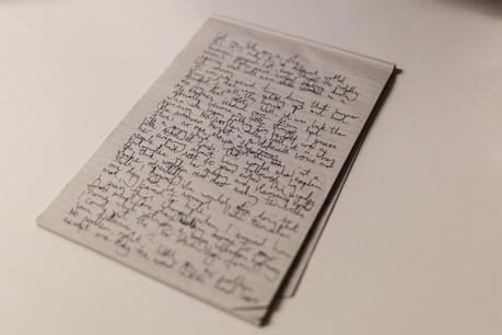 hand writing on notepad