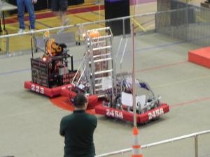 A Somerville robot (center)