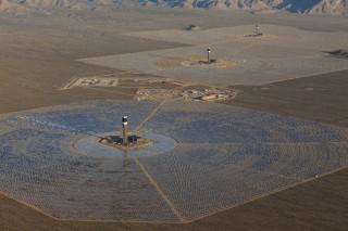 An aerial view of the Ivanpah Solar Power Facility with left to right Tower 1, 2 and 3.