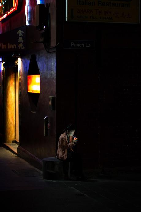 The usurping of King Fiasco man smoking cigarette in laneway