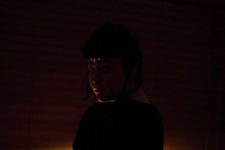 Lit from below figure in dark room