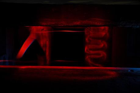 Bunker in red red light inside old bunker