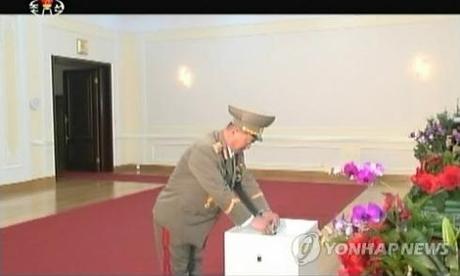 Minister of the People's Armed Forces Jang Jong Nam casts his ballot for Kim Jong Un for SPA deputy  on 9 March 2014 (Photo: KCTV-Yonhap).