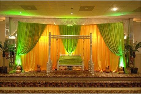 Yellow and green seating area for bride and groom