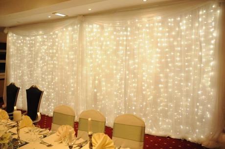 Fairy light backdrop to complement a yellow decor