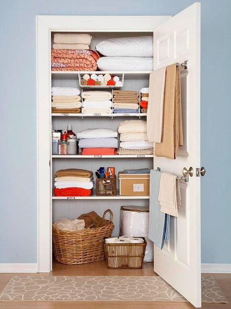 Use a towel rod on the inside of the linen closet for holding blankets.