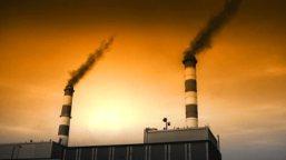 stock-footage-industrial-factory-building-with-smoke-stacks