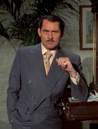 Robert Shaw’s Gray and Yellow Pinstripe Suit in The Sting Robert Shaw as Doyle Lonnegan in The Sting (1973).