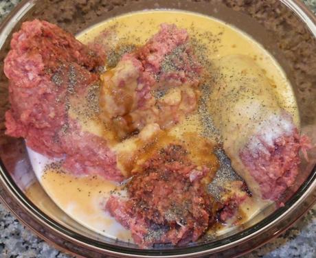 I added the reconstituted powdered eggs, fresh milk, salt, pepper, and soy sauce to my ground beef. Please note that I quadrupled this recipe, so this step-by-step will show a whole lot more meatballs than you will get out of one pound of ground meat.