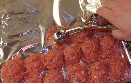 I used my handy medium (2 tablespoon) scoop to form the meatballs.  My husband hates a dense meatball, so I take care not to pack it too tight.