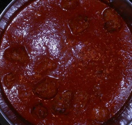 I added the meatballs to the sauce, and let them stew for at least 10 minutes.  The longer you let them simmer together, the better, so if you have an hour or so, let them stew so the flavors combine.