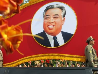 9th September 2013: National Day Parade in Pyongyang, North Korea A Kim Il Sung flag on one of the first cars that came past