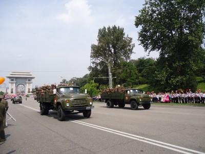 9th September 2013: National Day Parade in Pyongyang, North Korea The army parade gets underway as locals line the avenue.