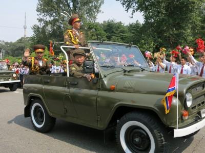 9th September 2013: National Day Parade in Pyongyang, North Korea Military vehicles drive past with lots of North Korean army guys, all proudly dressed and happy.