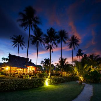 Bungalows at sunset in thailand paradise