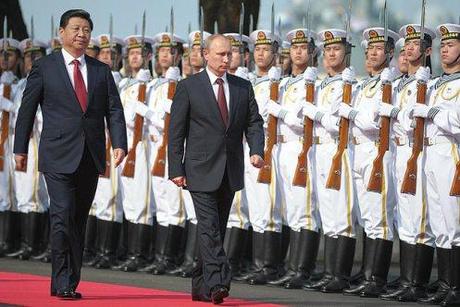 Presidents Xi Jinping and Putin inspect Chinese Naval forces.