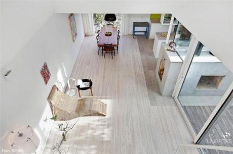 Nordic-Bliss-Scandinavian-Style-Mikael-Persbrandt-windows-bright-white-dining Mikael Persbrandt’s summer house is for sale