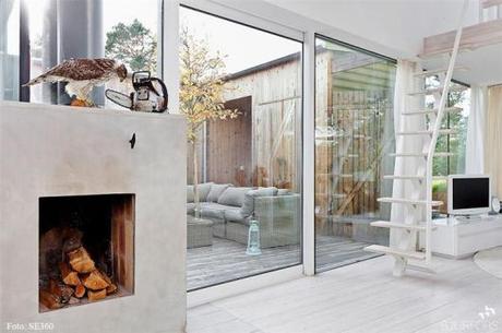 Nordic-Bliss-Scandinavian-Style-Mikael-Persbrandt-windows-bright-white-fire-place Mikael Persbrandt’s summer house is for sale