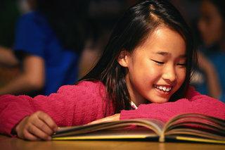 Girl Reading in School