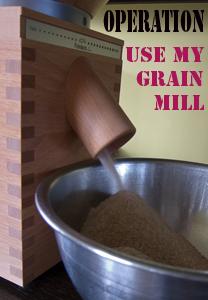 photo of grain mill, with flour pouring out, and the words Operation Use My Grain Mill