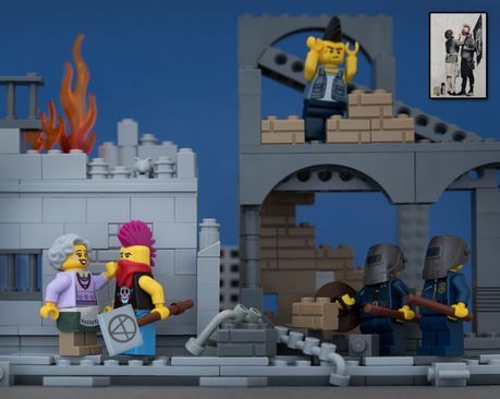 Screen Shot 2014 06 02 at 18.31.20 750x598 Classic Banksy pieces recreated in Lego by Jeff Friesen