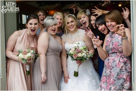wedding guests make silly faces at wedding at The Alma Inn