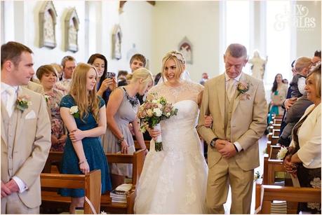 father walks bride up aisle at yorkshire wedding