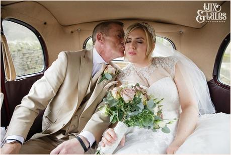 father kisses bride goodbye at yorkshire wedding