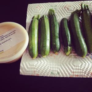 Keepin' it simple at the farmer's market. Locally-grown mini zucchinis and local-made smoked hummus. 