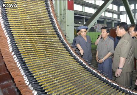 DPRK Premier Pak Pong Ju (L) tours Taean Heavy Machine Complex (Photo: KCNA).