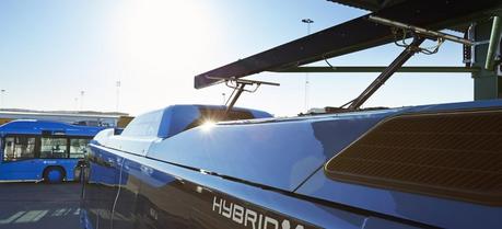 Hybrid Electric Buses to Be Demonstrated in Stockholm Volvo hybrid electric bus during charging in a garage.